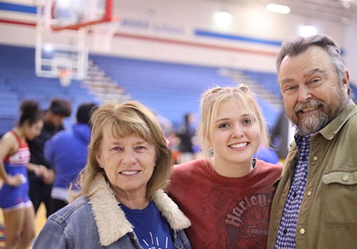 Bill and Sheryl celebrate Kylee at Senior Night